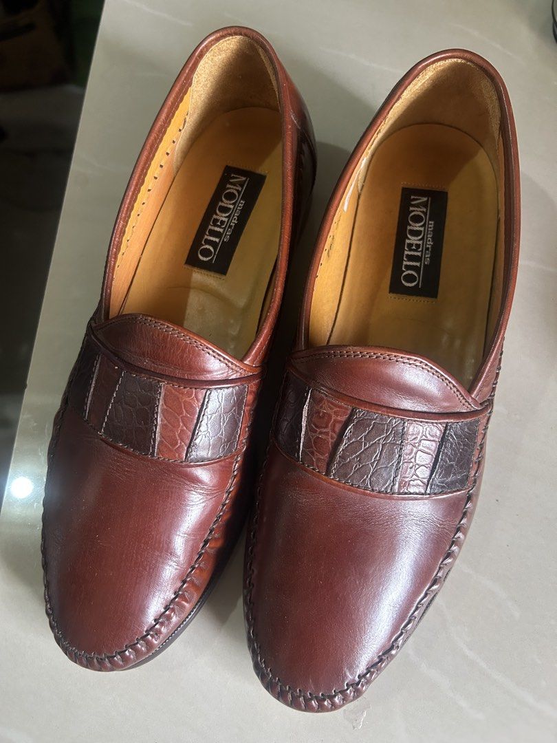 madras Modello casual shoes size 26 (Category: Casual Shoes) located in Cavite. Submitted by cecitrifthshop (Listing ID 1469955672, Image 1). Description: pair of Madras Modello men's leather loafers made in Japan, featuring a reddish-brown smooth leather body with textured faux crocodile leather accents strap size 26 like new made in japan .