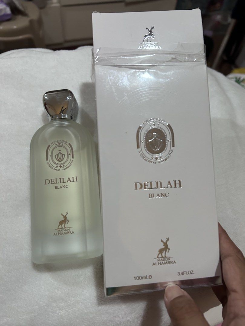 Maison Alhambra Delilah Blanc Eau De Parfum 100ml (Category: Fragrance & Deodorants) located in Pasig City. Submitted by vestidosetcetera (Listing ID 1469950785, Image 1). Description: - Brand: Maison Alhambra - Fragrance: Delilah Blanc - Size: 100ml - Concentration: Eau de Parfum (EDP) - Condition: Brand new (sprayed 2 times) - Packaging: Comes with original box and partial plastic wrap - Bottle Design: Glass bottle with silver cap and beige lab