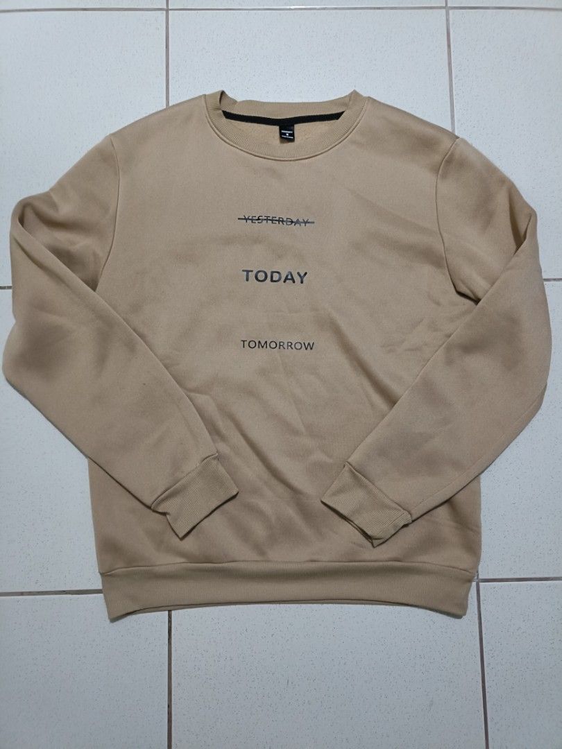 Manfinity Yesterday Today Tomorrow Beige Sweatshirt (Category: Coats, Jackets and Outerwear) located in Manila. Submitted by quartz.rewind (Listing ID 1470112359, Image 1). Description: "🔥 10% OFF if you buy any 2 items! / 15% OFF for 3+ items. Shipping can be combined to save you money. Valid this week only!" Description: Up for grabs is a clean khaki/beige crewneck sweatshirt from Manfinity (SHEIN Men). Features a sharp, minimalist front typog