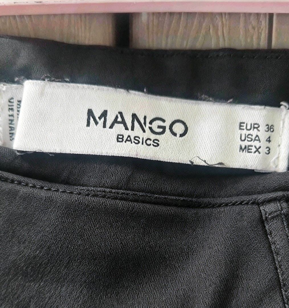Mango Basics Dark Gray Tailored Trousers (Category: Jeans) located in Naga. Submitted by bitchesabarbie (Listing ID 1469978446, Image 3). Description: - Elegant dark charcoal gray, sleek & polished fabric - Side zipper closure (no bulky front buttons) for a clean look - High-waisted design with flattering center seam detail - Cropped / ankle length — perfect for heels, flats, or sneakers - Very versatile: office, smart casual, events, or everyday
