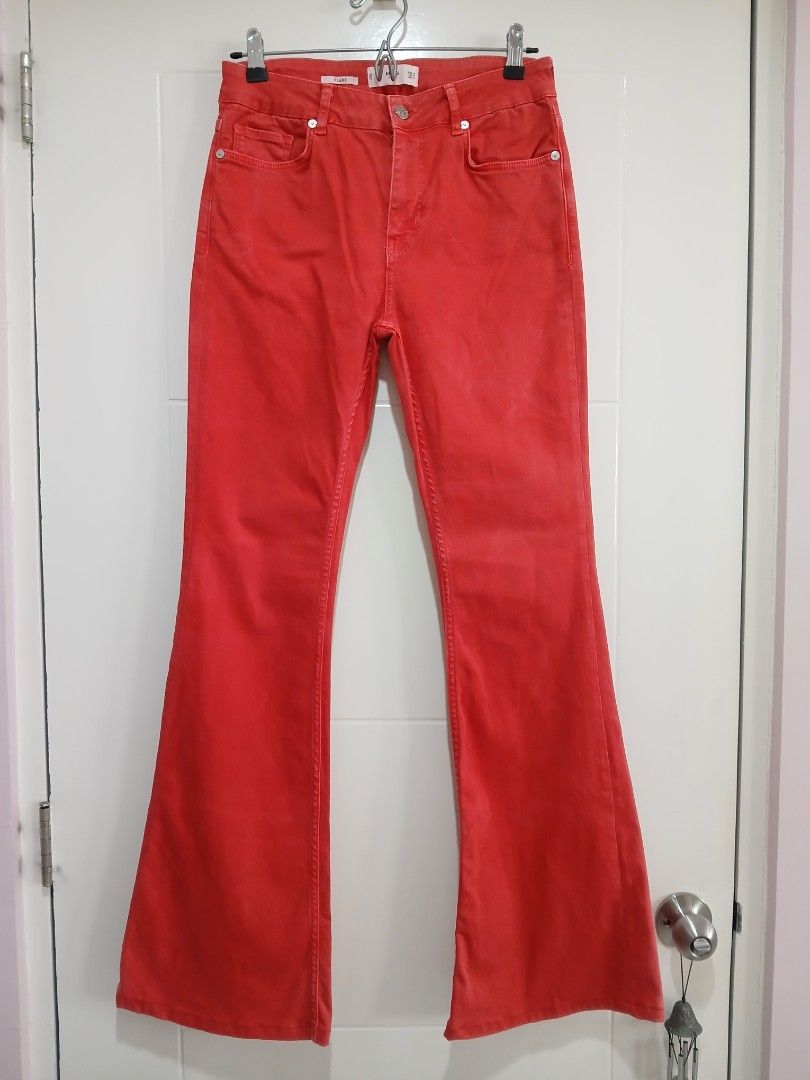 Mango Denim Red Flare Jeans Size EUR 38 (Category: Jeans) located in Paranaque City. Submitted by thepennydreadful (Listing ID 1470060321, Image 1). Description: - Brand: Mango Denim - Size: EUR 38 / USA 6 / MEX 5 - Stretch - Made in Turkey - Color: Vibrant red - Features: Classic five-pocket design, metal button closure with engraved branding, and stylish flared trouser legs - Condition: Great fit and silhouette, perfect for a pop of color in yo