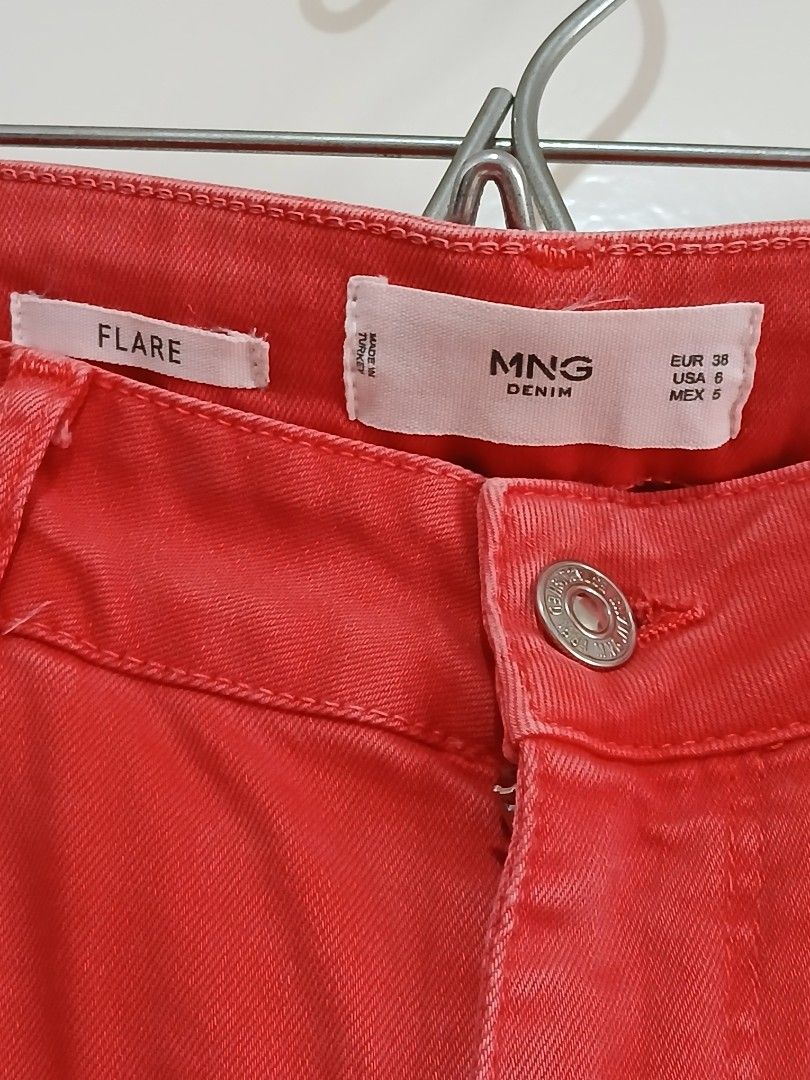 Mango Denim Red Flare Jeans Size EUR 38 (Category: Jeans) located in Paranaque City. Submitted by thepennydreadful (Listing ID 1470060321, Image 2). Description: - Brand: Mango Denim - Size: EUR 38 / USA 6 / MEX 5 - Stretch - Made in Turkey - Color: Vibrant red - Features: Classic five-pocket design, metal button closure with engraved branding, and stylish flared trouser legs - Condition: Great fit and silhouette, perfect for a pop of color in yo