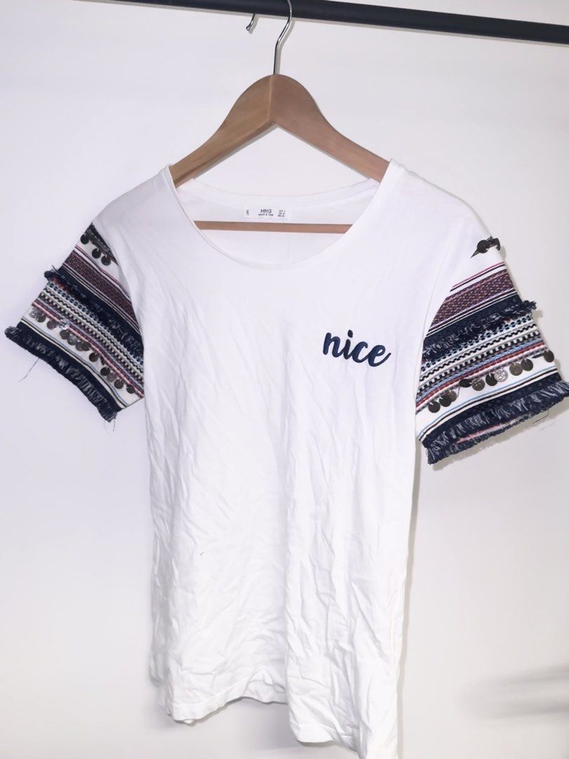 Mango Shirt Womens (Category: Shirts) located in Quezon City. Submitted by coolmomma (Listing ID 1470041238, Image 1). Description: Good condition just needs to be ironed Length 25 in. Small kn tag but fits Small to medium.