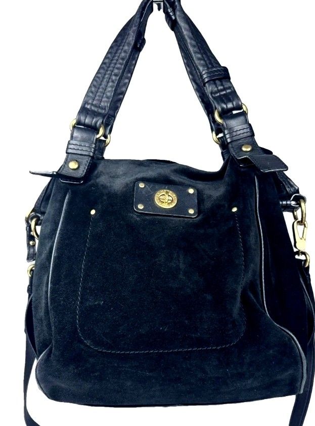 Marc by Marc Jacobs black suede handbag (Category: Cross-body Bags) located in Manila. Submitted by lene48 (Listing ID 1469964063, Image 1). Description: - Brand: Marc by Marc Jacobs - Material: Rich black suede with smooth leather trim - Hardware: Gold-tone throughout with signature turn-lock front pocket - Straps: Dual leather shoulder straps + adjustable, detachable crossbody strap - Interior: Spacious main compartment for daily essentials - S