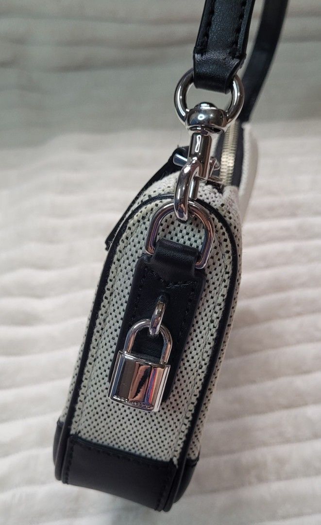 Marc Jacobs Drifter Bag (Category: Shoulder Bags) located in Bocaue. Submitted by thewardrobehub (Listing ID 1470093443, Image 3). Description: - 100% Authentic - convertible to wristlet - Black and white canvas with black leather trim .