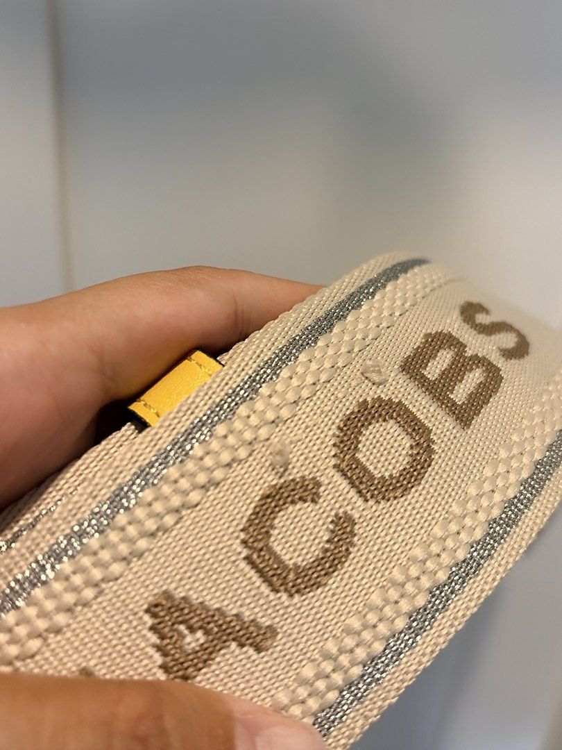 Marc Jacobs Yellow Chain Shoulder Bag (Category: Luxury Bags & Wallets) located in Manila. Submitted by rd_sell (Listing ID 1470023916, Image 3). Description: - Authentic Marc Jacobs leather shoulder bag in a vibrant bright yellow - Dual strap options: chunky silver chain strap and extra wide branded fabric strap - Secure magnetic flap closure with signature metal logo upfront - Convenient slip pocket on the back - Clean interior and exterior (mi