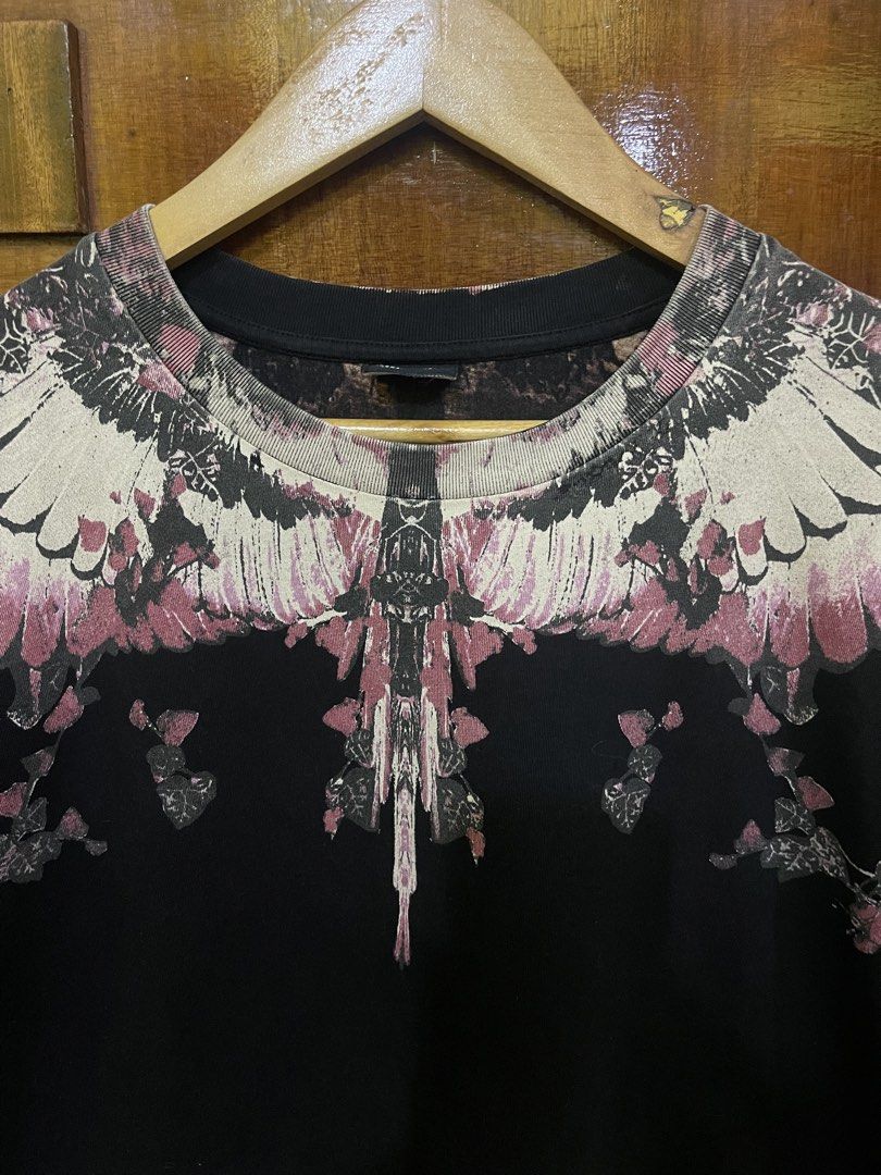 Marcelo Burlon Shirt (Category: Luxury Apparel) located in Marikina City. Submitted by greatfindsmnlph (Listing ID 1470135348, Image 2). Description: Mar celo Bur lon Shirt Price: 250 Size: Medium Width: 21 Length: 28 Color: Black Color Rate: 10/10 Condition: 9.9/10 may pinhole Very nice in actual.