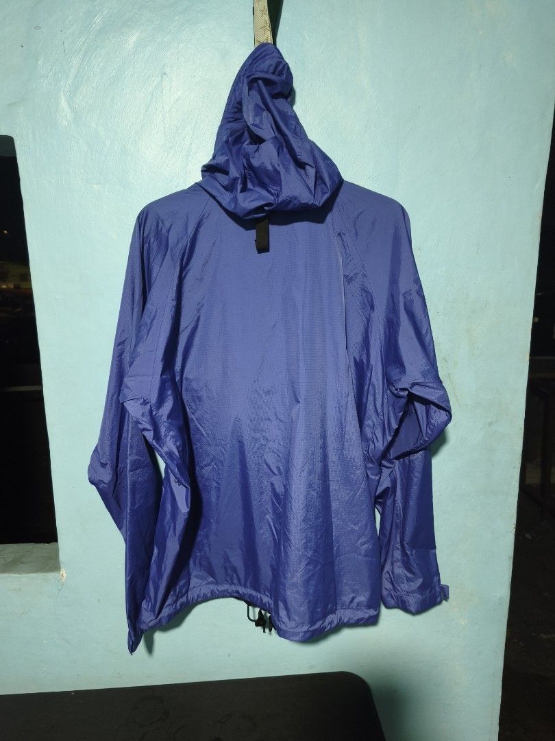 Marmot Blue Hooded Windbreaker Jacket (Category: Coats, Jackets and Outerwear) located in Cavite. Submitted by billcleantone (Listing ID 1470081321, Image 2). Description: - Brand: Marmot - Color: Vibrant blue - Material: Lightweight ripstop fabric - Closure: Full zip front with hidden snap-button placket - Hood: Attached with adjustable drawcords - Hem: Adjustable drawcord to seal out wind - Details: Embroidered Marmot logo on front lower left, 
