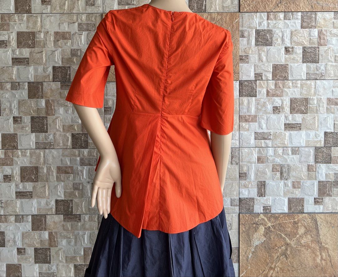 MARNI - “ VIBRANT CONSTRUCTED “ TOP (Category: Blouses) located in Bacolod City. Submitted by timelessbyjosh (Listing ID 1470001837, Image 3). Description: BEST FOR CASUAL & FORMAL OUTFITS SIZE : 40 ACTUAL COLOR : LIGHT ORANGE COLOR RATE : 10 OUT OF 10 CONDITION : NEAR NEW MATERIAL : 100 % COTTON MADE IN : PORTUGAL FLAWS : NONE DIMENSIONS LENGTH - 24 ( FRONT ) & 26 ( BACK ) WIDTH - 17 MEASUREMENT TAKEN WHILE LAYING FLAT. PLEASE COMPARE THE MEASUR