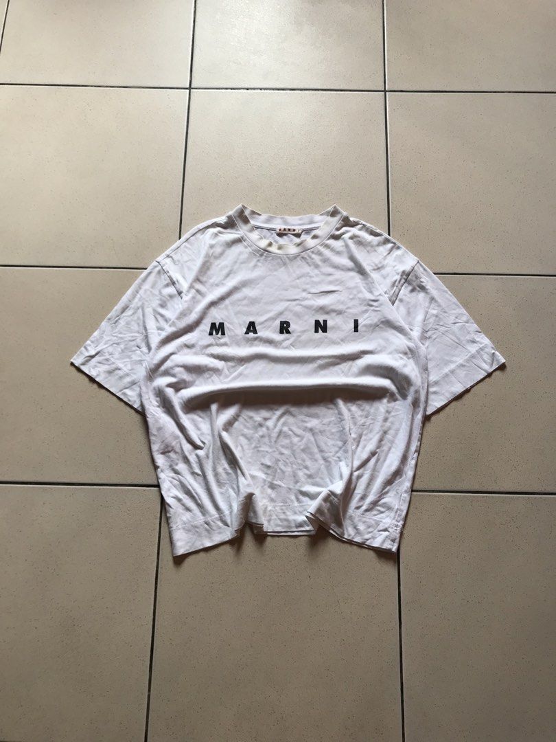 Marni White Logo Print T-Shirt (Category: Shirts) located in Cebu City. Submitted by no3spass1ng (Listing ID 1469988263, Image 1). Description: Marni White Logo Print T-Shirt Size Medium Dimes: 22 x 26 very good condition see pics 📍 Cebu city.