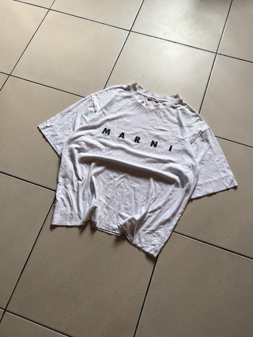 Marni White Logo Print T-Shirt (Category: Shirts) located in Cebu City. Submitted by no3spass1ng (Listing ID 1469988263, Image 2). Description: Marni White Logo Print T-Shirt Size Medium Dimes: 22 x 26 very good condition see pics 📍 Cebu city.