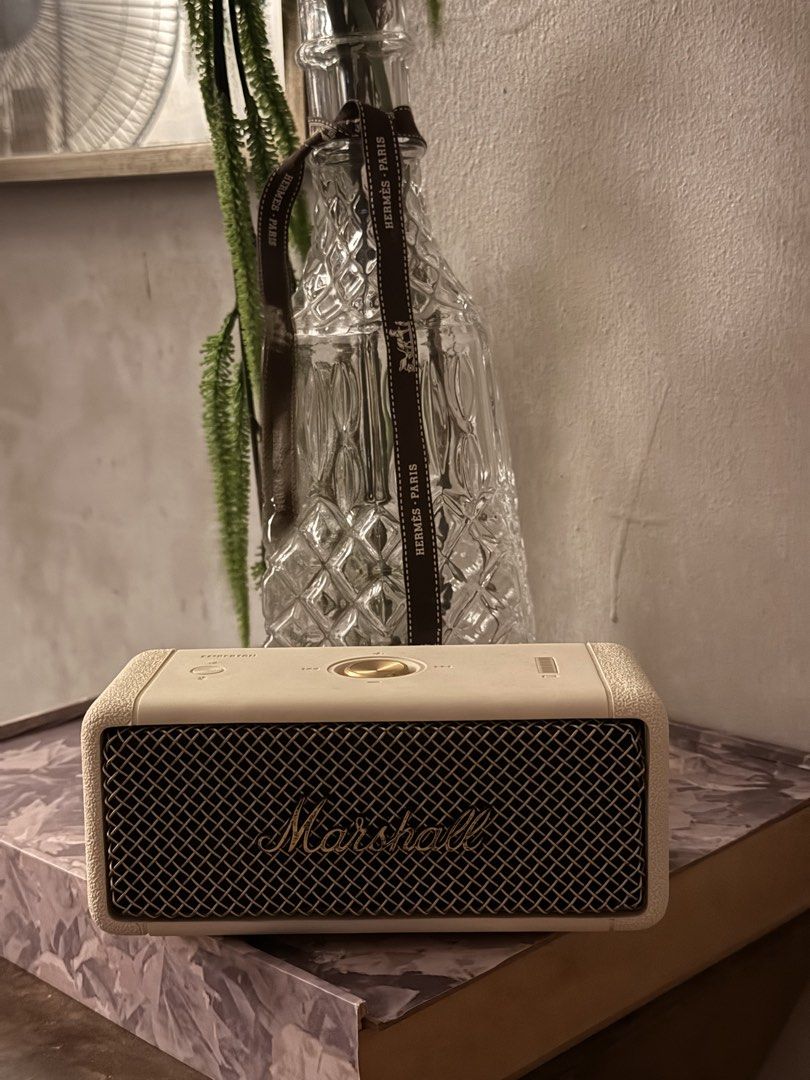 Marshall Emberton II Speaker (Category: Soundbars, Speakers & Amplifiers) located in Manila. Submitted by justhazel (Listing ID 1470092673, Image 2). Description: - Model: Marshall Emberton Portable Bluetooth Speaker - Color: Cream - Condition: Clean body, works great - Design: Iconic Marshall look with metal grille and gold multi-directional control knob - Audio: Compact size that packs a powerful punch - Connectivity: Easy Bluetooth pairing wit