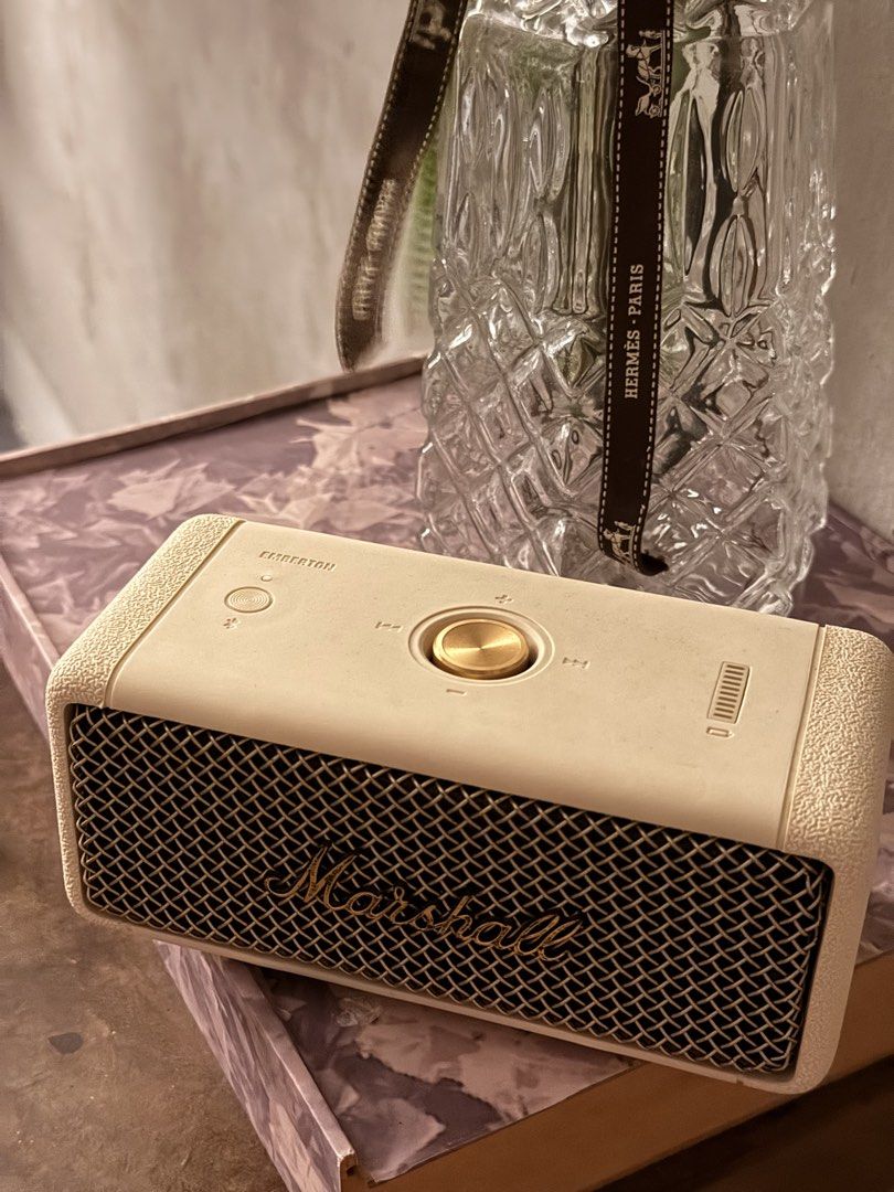 Marshall Emberton II Speaker (Category: Soundbars, Speakers & Amplifiers) located in Manila. Submitted by justhazel (Listing ID 1470092673, Image 1). Description: - Model: Marshall Emberton Portable Bluetooth Speaker - Color: Cream - Condition: Clean body, works great - Design: Iconic Marshall look with metal grille and gold multi-directional control knob - Audio: Compact size that packs a powerful punch - Connectivity: Easy Bluetooth pairing wit