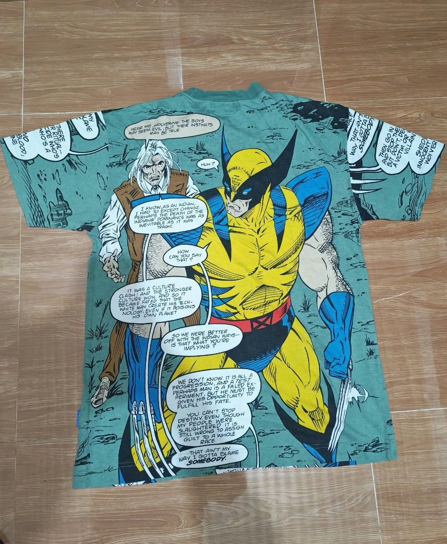 Marvel Comics Wolverine X-Men All Over Print T-Shirt (Category: Tshirts & Polo Shirts ) located in Baguio. Submitted by solo_ukay (Listing ID 1470064048, Image 3). Description: - Item: Marvel Comics Wolverine All-Over Print T-Shirt - Color: Green base with comic book dialogue panels (front and back) - Size: Small - Details: Ribbed crew neck collar, Marvel Comics neck tag, and woven X-Men side hem tag - Condition: Super rare graphic tee, perfect f
