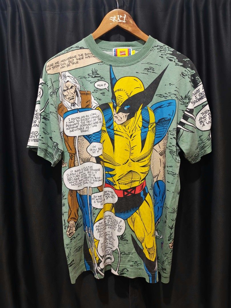 Marvel Comics Wolverine X-Men All Over Print T-Shirt (Category: Tshirts & Polo Shirts ) located in Baguio. Submitted by solo_ukay (Listing ID 1470064048, Image 1). Description: - Item: Marvel Comics Wolverine All-Over Print T-Shirt - Color: Green base with comic book dialogue panels (front and back) - Size: Small - Details: Ribbed crew neck collar, Marvel Comics neck tag, and woven X-Men side hem tag - Condition: Super rare graphic tee, perfect f