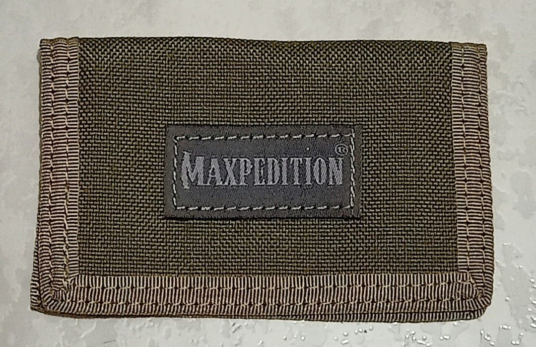 Maxpedition Pouch + Micro Wallet (Category: Belt bags, Clutches and Pouches) located in Ayungon. Submitted by umangon (Listing ID 1469959554, Image 3). Description: may issue sa plastic window nag crack sa storage.