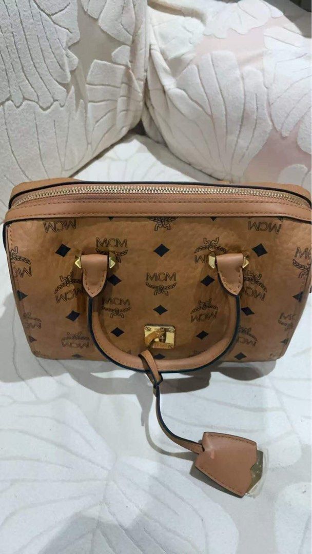 MCM Visetos Boston Bag (Category: Luxury Bags & Wallets) located in Manila. Submitted by ivyfv04 (Listing ID 1469970376, Image 1). Description: MCM Visetos Boston Bag Pre owned luxury bag Wala na resibo , nawala na Can check in actual.