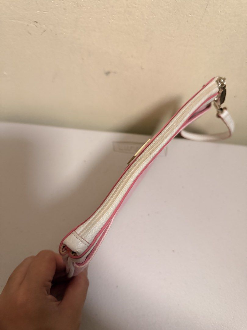 MCM Wristlet (Category: Wallets & Card holders) located in Batangas. Submitted by stopandshopforluxury (Listing ID 1470052305, Image 3). Description: GUARANTEED ORIGINAL **kasama 'to sa tote bag ko pero eto lang ibebenta ko for now. No issue and fixed.