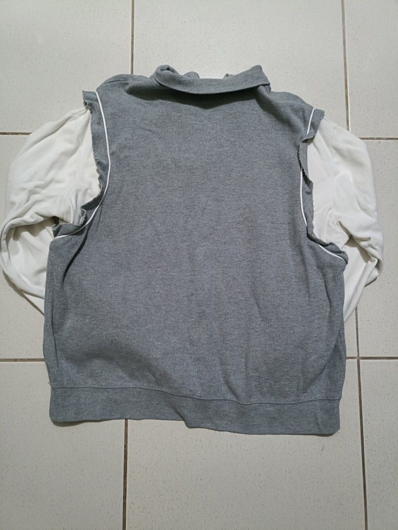 MDPG Grey Friends Two-Tone Long Sleeve Zip Sweatshirt (Category: Coats, Jackets and Outerwear) located in Manila. Submitted by quartz.rewind (Listing ID 1470116285, Image 2). Description: (Slightly negotiable for fast buyers) Description: Up for grabs is a unique pre-layered 1/4 zip polo sweater from MDPG. Designed with an indie-streetwear raw edge grey ribbed body over stitched contrast white sleeves. Features a bold forest green "FRIENDS FRIEND