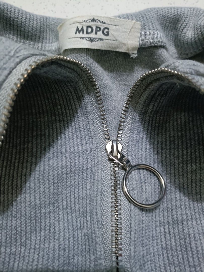 MDPG Grey Friends Two-Tone Long Sleeve Zip Sweatshirt (Category: Coats, Jackets and Outerwear) located in Manila. Submitted by quartz.rewind (Listing ID 1470116285, Image 3). Description: (Slightly negotiable for fast buyers) Description: Up for grabs is a unique pre-layered 1/4 zip polo sweater from MDPG. Designed with an indie-streetwear raw edge grey ribbed body over stitched contrast white sleeves. Features a bold forest green "FRIENDS FRIEND