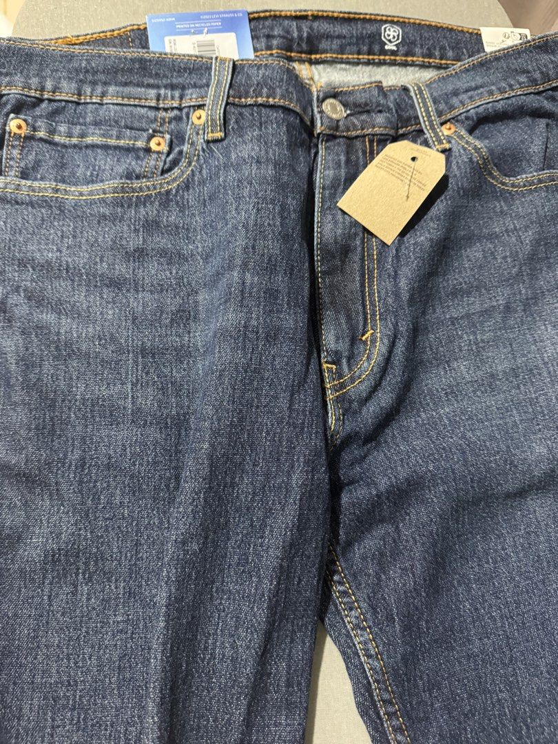 Men’s Levi's 511 Slim Stretch W36 L32 (Category: Jeans) located in Mandaluyong City. Submitted by raykin (Listing ID 1470012694, Image 3). Description: - Brand: Levi's 511 Slim Fit - Condition: Brand new with original tags attached - Size: Waist 36, Length 32 - Color/Wash: Dark blue - Material: Stretch fabric with cool performance tech for breathability and lightweight comfort - Fit: Sits below the waist with a slim leg throughout.