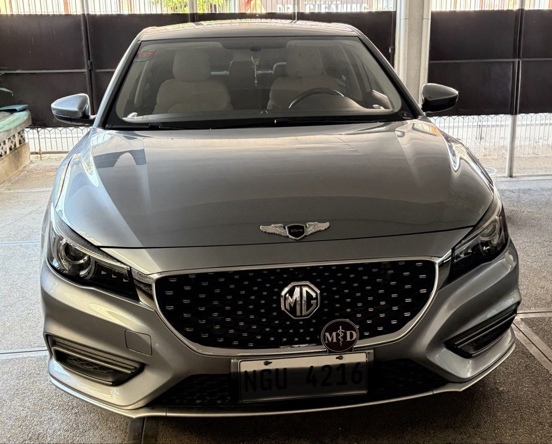 MG 6 (Category: Used Cars) located in Quezon City. Submitted by docbato (Listing ID 1470137858, Image 1). Description: • Year Model: 2020 • Variant: MG6 Trophy • Mileage: Only 30,000 km • Engine: 1.5L Turbo Gasoline • Transmission: Automatic • Color: Carbon Gray • Registration: LTO registered • Location: Araneta City, Cubao, Metro Manila Features: • Panoramic sunroof • Leather seats • Digital instrument cluster • Touchscreen infotainment system, 