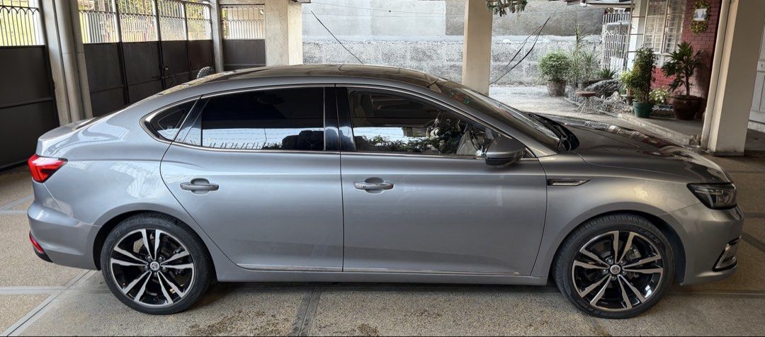 MG 6 (Category: Used Cars) located in Quezon City. Submitted by docbato (Listing ID 1470137858, Image 2). Description: • Year Model: 2020 • Variant: MG6 Trophy • Mileage: Only 30,000 km • Engine: 1.5L Turbo Gasoline • Transmission: Automatic • Color: Carbon Gray • Registration: LTO registered • Location: Araneta City, Cubao, Metro Manila Features: • Panoramic sunroof • Leather seats • Digital instrument cluster • Touchscreen infotainment system, 