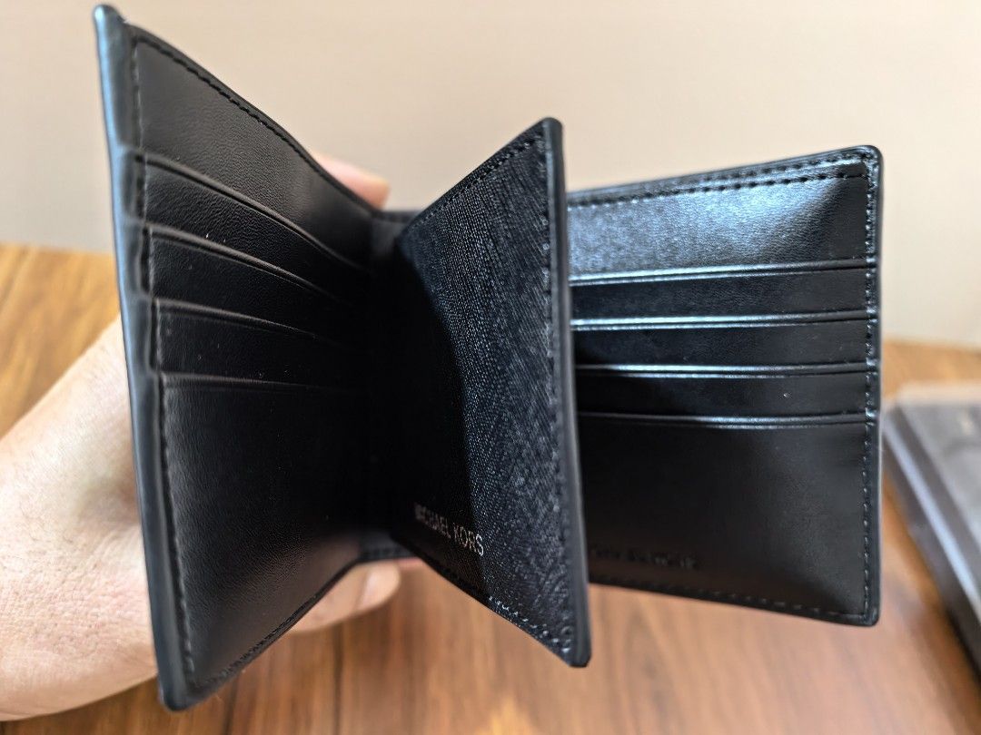 Michael Kors Cooper Men Black Billfold Wallet & Passcase Bifold (Category: Wallets & Card Holders) located in Manila. Submitted by anikar20 (Listing ID 1469949844, Image 3). Description: 🖤 MICHAEL KORS (MK) MEN'S COOPER BLACK WALLET 🖤 Selling Michael Kors Men's Cooper Black Wallet, bought in the USA 🇺🇸 ✨ Condition: Good as new — never used ✔️ Guaranteed original ✔️ Bought in the USA ✔️ Classic black design — stylish and timeless ✔️ No box inc