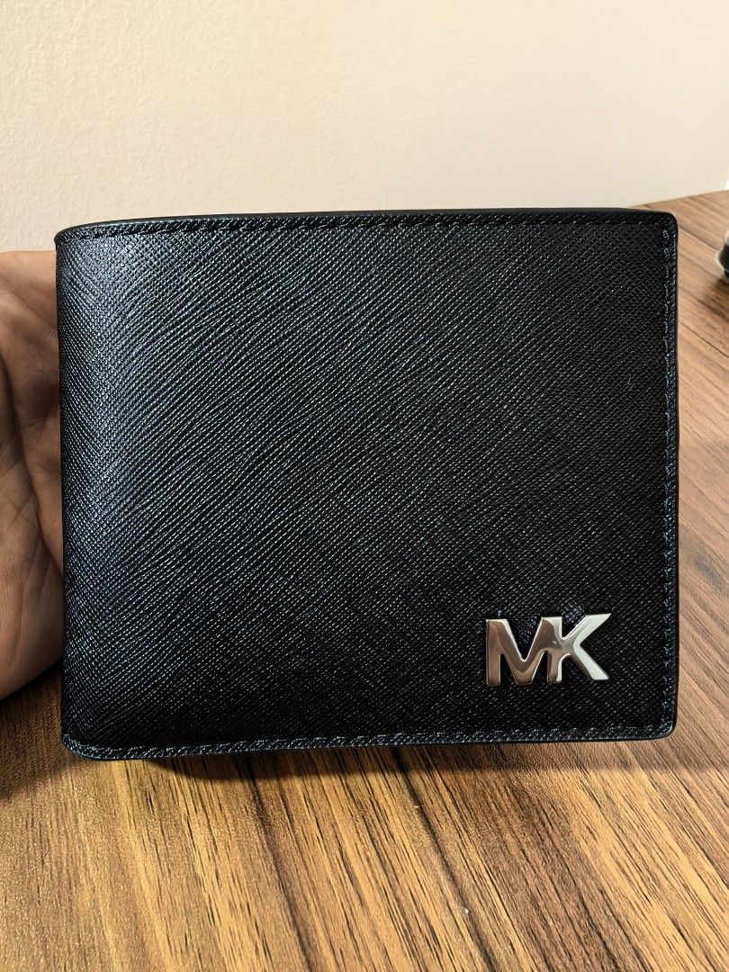 Michael Kors Cooper Men Black Billfold Wallet & Passcase Bifold (Category: Wallets & Card Holders) located in Manila. Submitted by anikar20 (Listing ID 1469949844, Image 1). Description: 🖤 MICHAEL KORS (MK) MEN'S COOPER BLACK WALLET 🖤 Selling Michael Kors Men's Cooper Black Wallet, bought in the USA 🇺🇸 ✨ Condition: Good as new — never used ✔️ Guaranteed original ✔️ Bought in the USA ✔️ Classic black design — stylish and timeless ✔️ No box inc