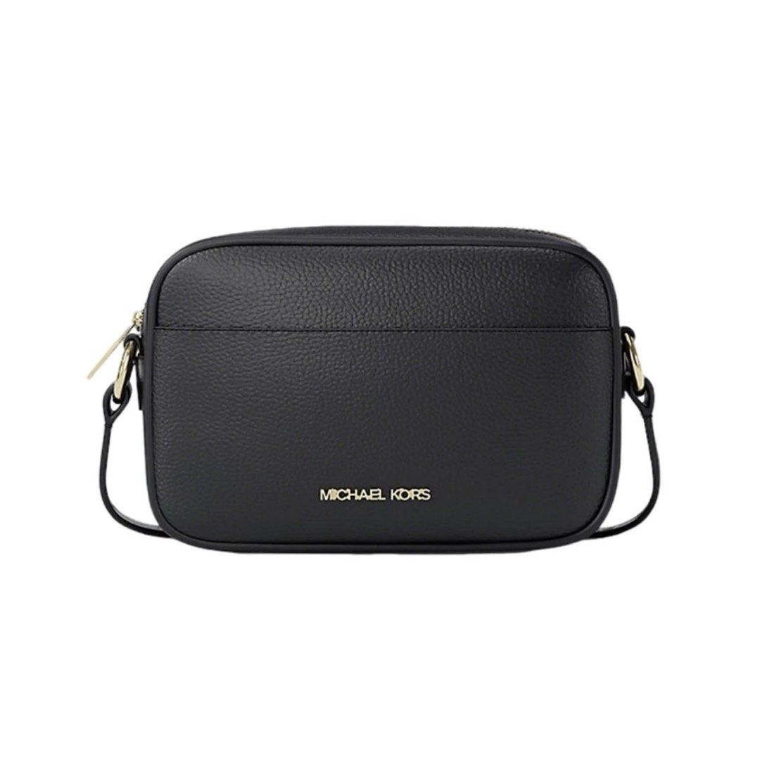 MICHAEL KORS Jet Set Crossbody Bag (Category: Cross-body Bags) located in Paranaque City. Submitted by _ngllou (Listing ID 1470082130, Image 2). Description: MICHAEL KORS Women’s Jet Set Small Pebbled Leather Camera Crossbody Bag in Black ↪︎ Authentic Michael Kors crossbody bag ↪︎ Material: Premium black pebbled leather with chic gold-tone hardware ↪︎ Closure: Secure zip-top closure ↪︎ Interior: Fabric-lined with a convenient slip pocket ↪︎ Exter