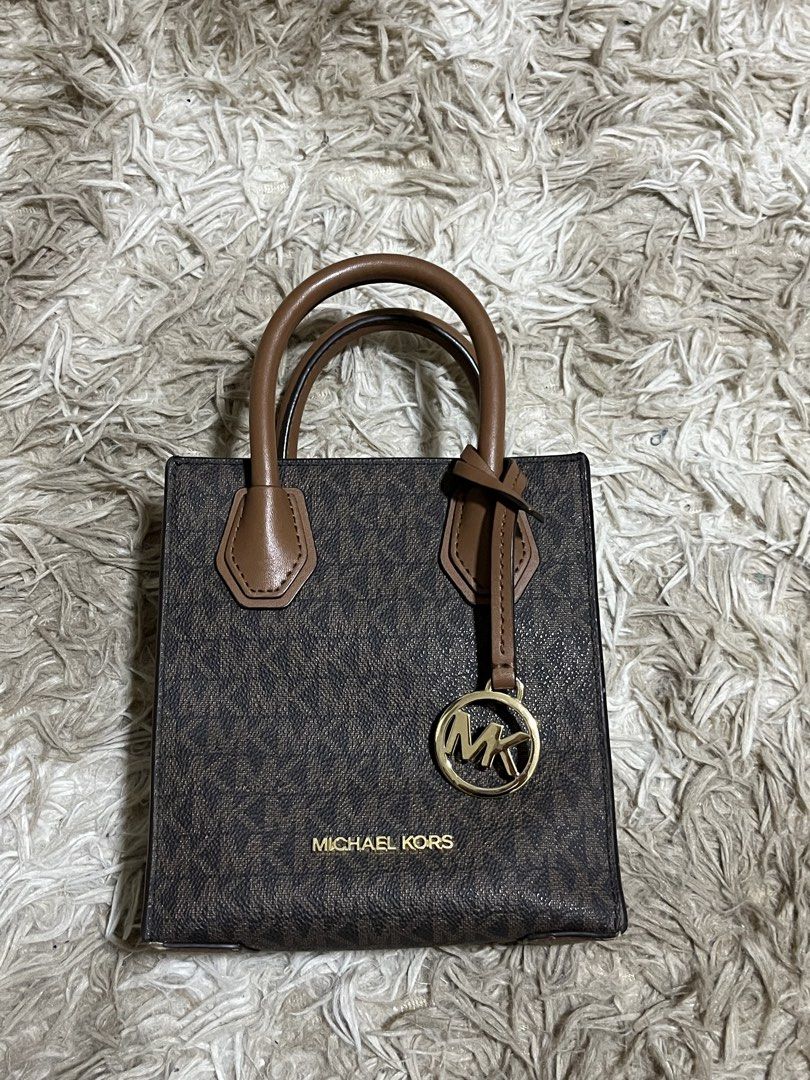 Michael Kors Mercer Crossbody Bag (Category: Cross-body Bags) located in Mandaluyong City. Submitted by declutters_cb (Listing ID 1470098334, Image 1). Description: negotiable.