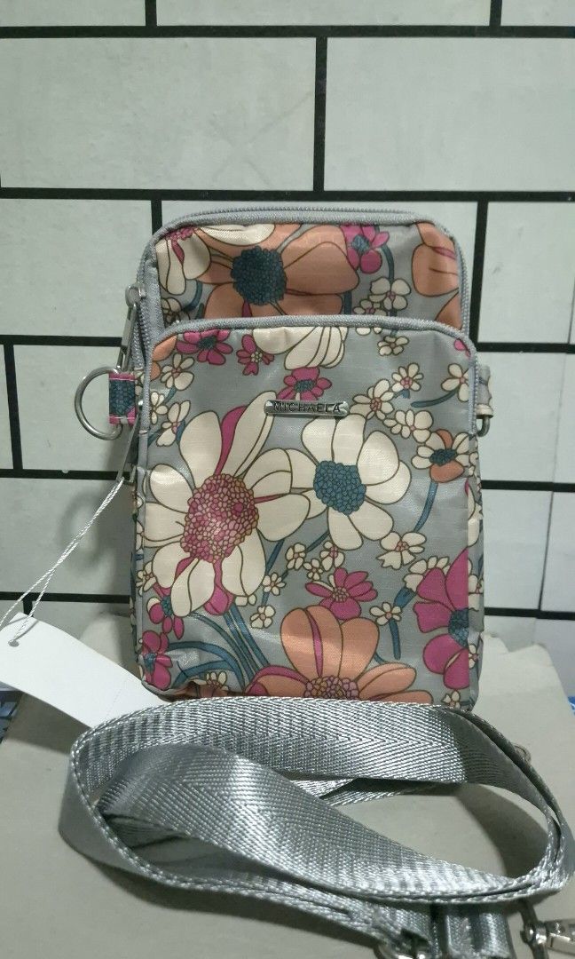 Michaela Floral Mini Sling Bag (Category: Cross-body Bags) located in Bulacan. Submitted by rgrs.collexn (Listing ID 1469960542, Image 2). Description: 599 SRP Di nagamit tho. Na-store lang kaya need to wipe ung hardwares pero wala naman tarnish. Mini but incredible. Marami mailalagay. ❤️ ✨ Check out my listings for more affordable preloved finds! ✨ Please manage your expectations as all items are preloved. Any flaw/s, if applicable, will be clea