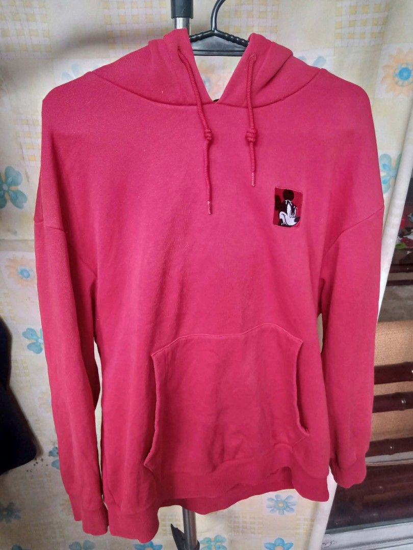 Disney MICKEY MOUSE red hoodie (Category: Hoodies) located in Pasig City. Submitted by rjkfindsofficial (Listing ID 1470009912, Image 1). Description: Mickey Mouse Red Hoodie Disney x Li-Ning Dimes W22 L27 Embroid Mickey Mouse Logo Meron naka print na 'Mickey Mouse' under hoodie (may crack sa print) Color Rate 9/10 Pre loved Need wash No issue.