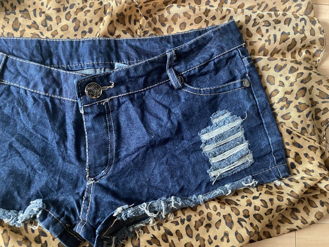 micro low rise dark blue distressed denim shorts (Category: Shorts) located in Manila. Submitted by lavernsloop (Listing ID 1470075536, Image 2). Description: size 29-30 | low hard denim | lenght 9 📩DM FOR MORE DEETS.