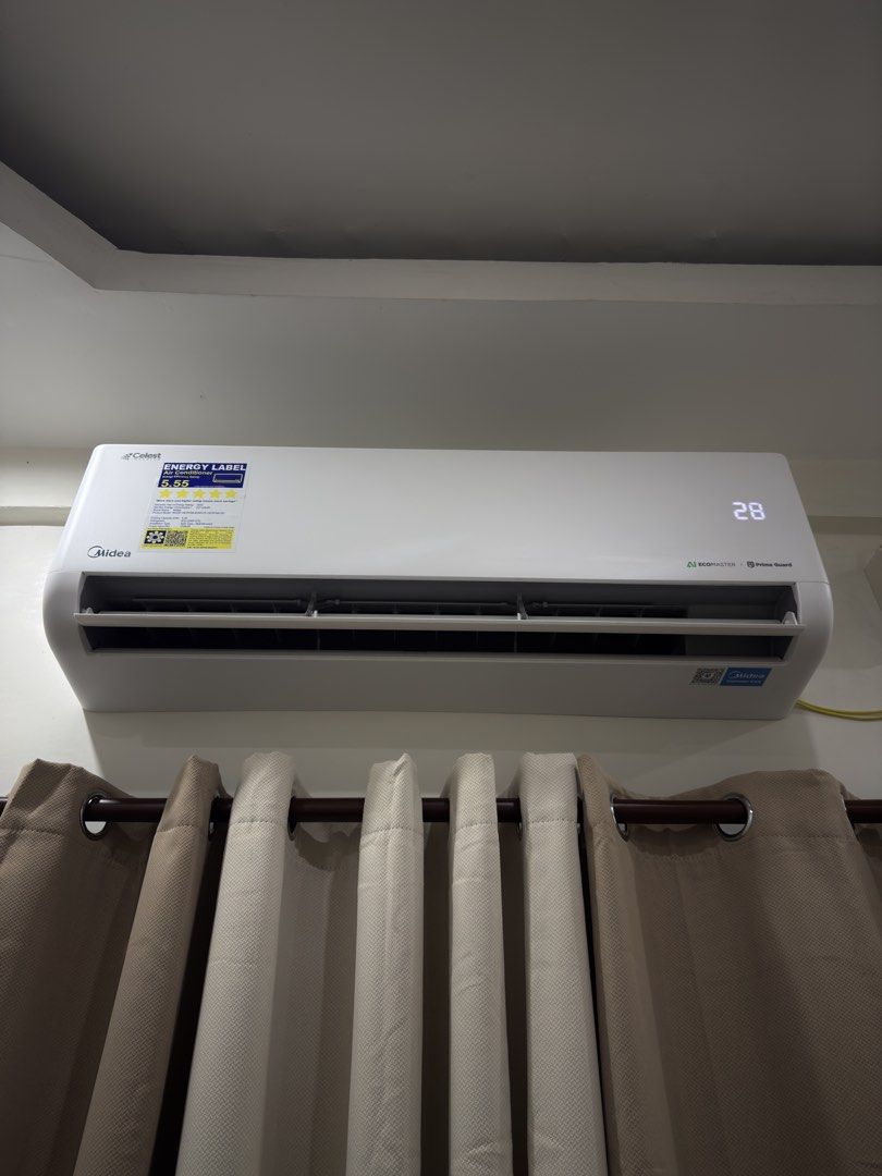 for sale: midea celest inverter split type aircon, 2.0hp (Category: Air Conditioning and Heating) located in Manila. Submitted by aeonskye (Listing ID 1469981393, Image 1). Description: for sale: midea celest inverter split type aircon, 2.0hp bought for PHP 33,500.00 selling for PHP 24,000.00 rfs: moving out • bought april 29, 2026, barely used • everything fully working, no issues • outdoor unit installed sa covered terrace, never exposed to rai