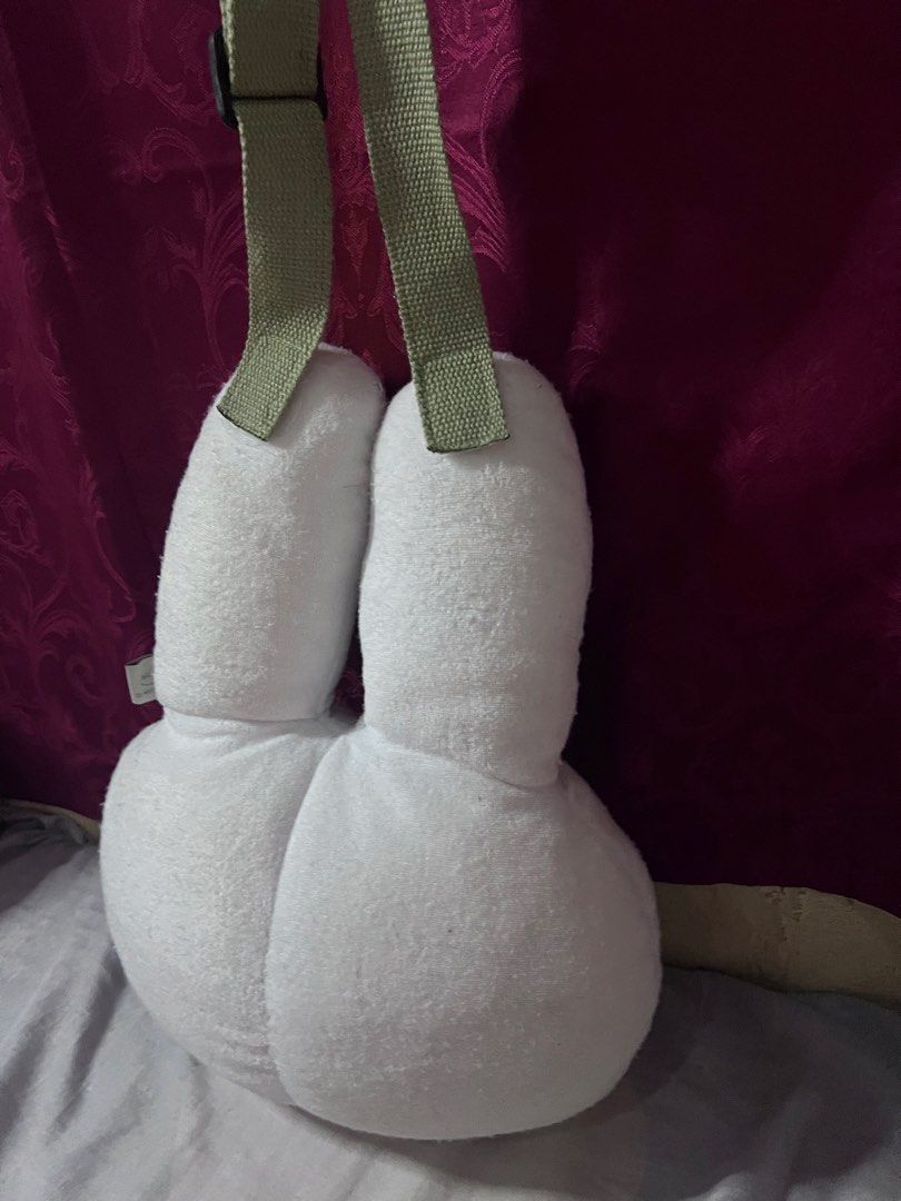 Miffy plush face crossbody bag white (Category: Cross-body Bags) located in Bulacan. Submitted by haven_plushie_dolls.888 (Listing ID 1470103963, Image 3). Description: - Authentic Miffy plush face crossbody bag - Soft towel-like fabric material in clean condition - Adjustable green canvas strap with buckle closure - Features 'Enjoy with Bruna' and Mercis bv tag - Perfect cute accessory for daily use or casual outings - need wash.