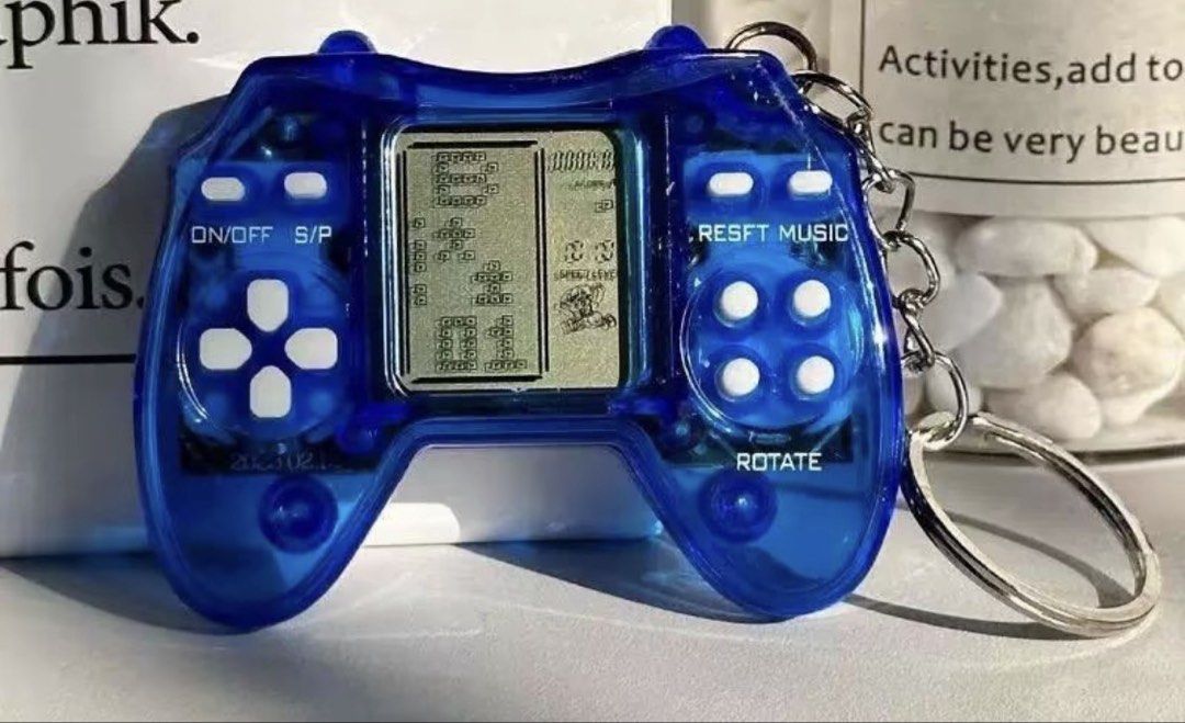 Mini brick game keychain (Category: Educational & Learning Toys) located in Manila. Submitted by vintageaccessories (Listing ID 1469984779, Image 1). Description: .