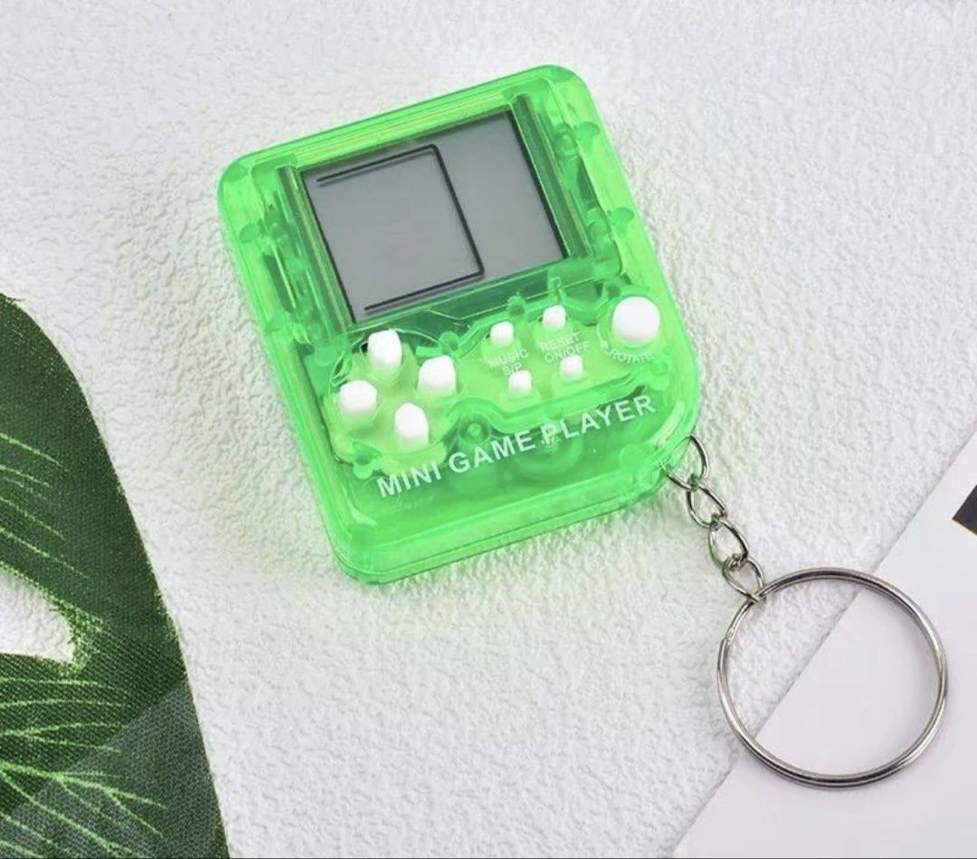 Mini brick game keychain (Category: Educational & Learning Toys) located in Manila. Submitted by vintageaccessories (Listing ID 1469984779, Image 2). Description: .
