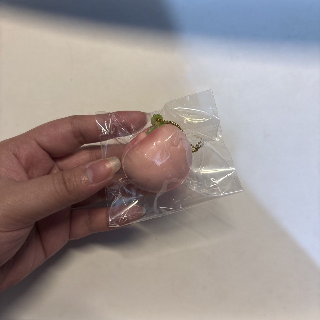 Mini Peach Fruit Squishy (Category: Interactive Toys) located in Manila. Submitted by buttern0t (Listing ID 1470076326, Image 1). Description: 💌 for proof of transactions & safekeeping of items , dm us on IG @dara.aniks / @puffyberries ✮⋆˙.