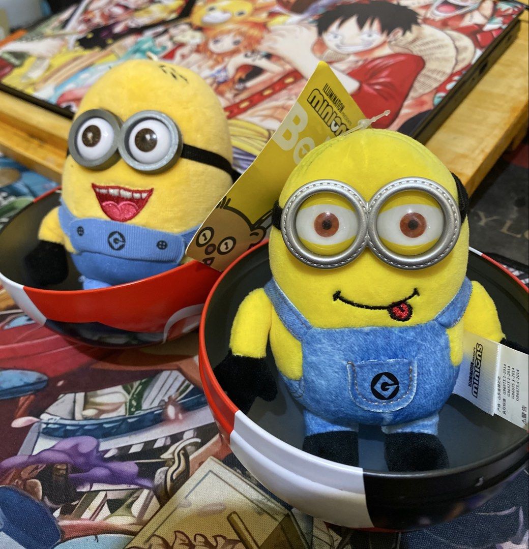 Minions Plush Toy Set with Tin Containers (Category: Plushies & Soft Toys) located in Baguio. Submitted by thrift_bonita (Listing ID 1470034212, Image 2). Description: - Set of 2 adorable Minions plush toys - Comes in unique round tin containers - Features two expressions: tongue sticking out (with tag) and big laughing mouth - Made with soft fabric material and detailed embroidery - Fun and collectible set, perfect for Minions fans.