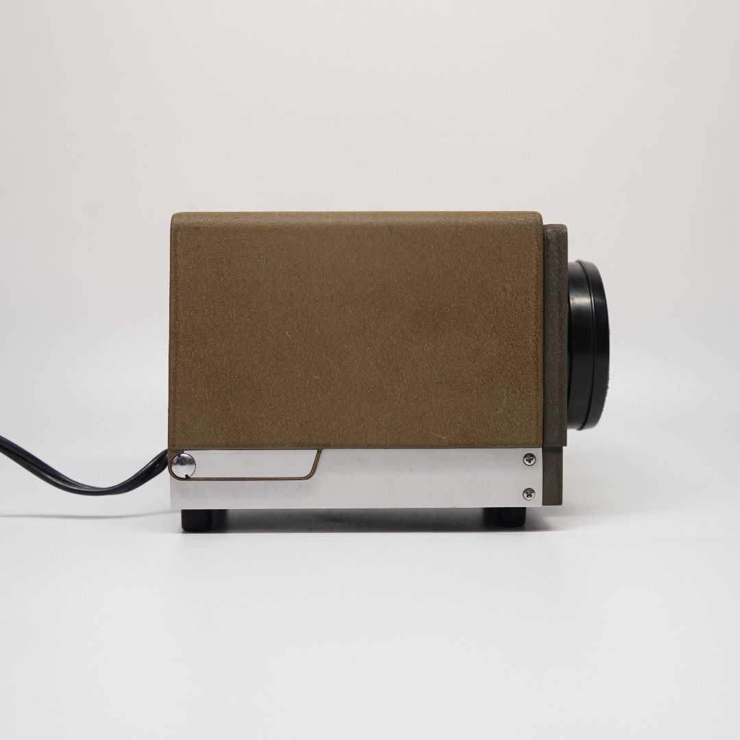 MINOLTA MINI-35 — 35MM SLIDE PROJECTOR (Category: Projectors) located in Las Pinas. Submitted by retrocameraph (Listing ID 1470106240, Image 2). Description: 📽️ MINOLTA MINI-35 — 35MM SLIDE PROJECTOR A vintage Minolta waiting for its next chapter! ✨ • P-Rokkor 75mm f/2.5 projection lens • Clean lens and presentable overall condition • Great for display, collecting, or future restoration ⚠️ Bulb is busted and needs replacement. Projection functio
