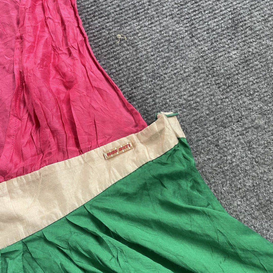 Miss sixty y2k mini dress (Category: Luxury Apparel) located in Iloilo. Submitted by 3ift2heav3n (Listing ID 1469958991, Image 3). Description: Miss sixty sleeveless mini dress featuring a hot pink pleated bodice, a neutral/beige waist band, and a bright green flared skirt. Authentic Small to medium Excellent condtion No flaws.