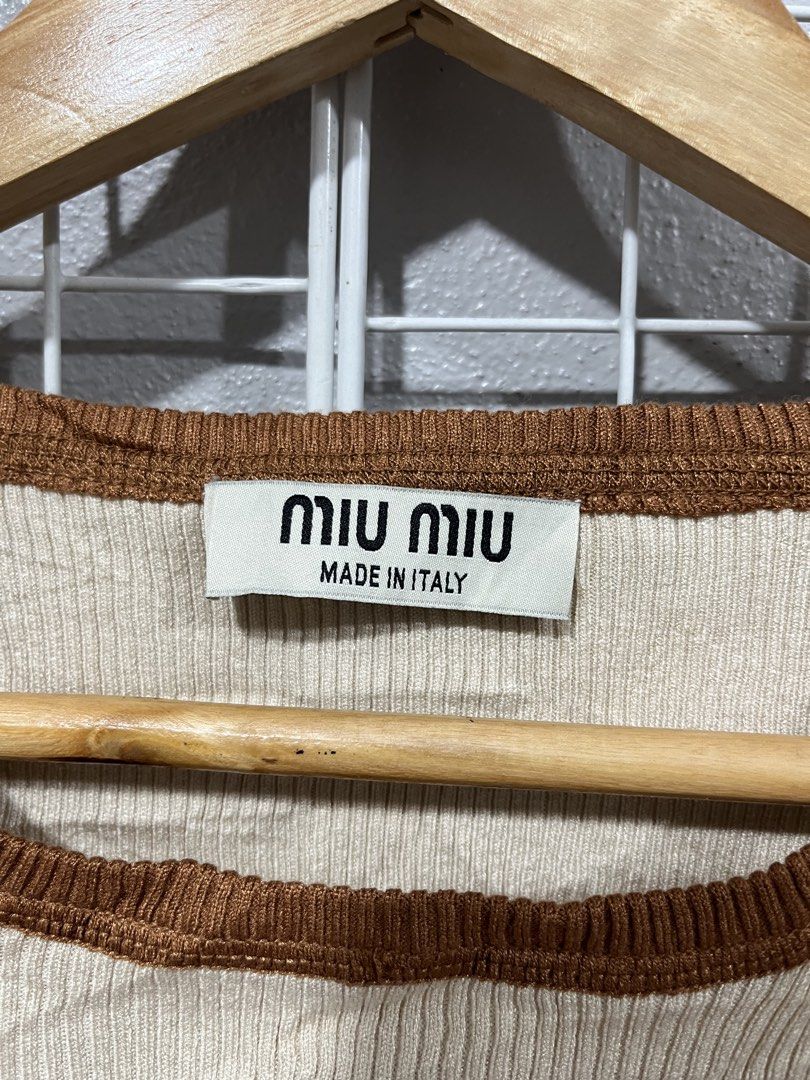 Miu Miu Knit Crop Tee (Category: Luxury Apparel) located in Tuguegarao City. Submitted by preowned_curation (Listing ID 1470055509, Image 3). Description: Beige in color Size 38 (19x15.5) Stretchable fabric Flawless 999 + SF.