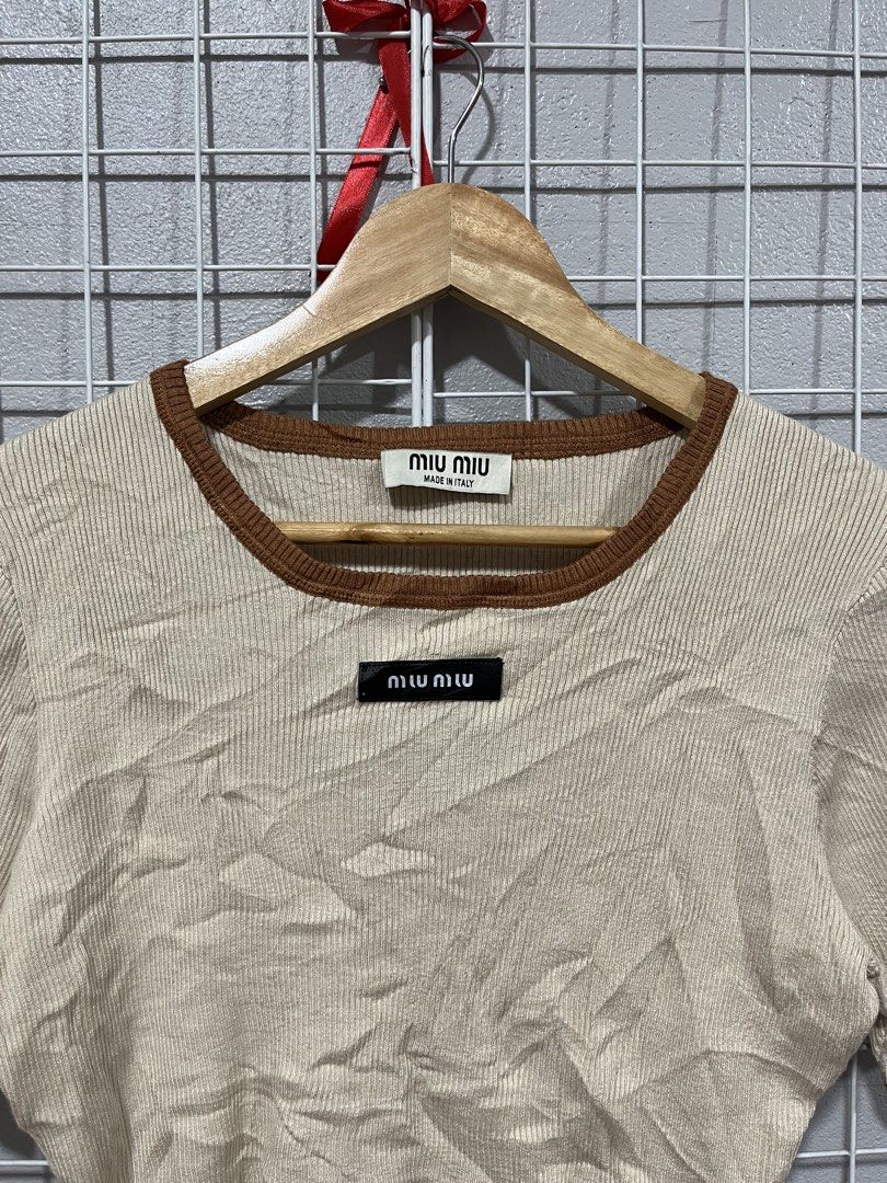 Miu Miu Knit Crop Tee (Category: Luxury Apparel) located in Tuguegarao City. Submitted by preowned_curation (Listing ID 1470055509, Image 2). Description: Beige in color Size 38 (19x15.5) Stretchable fabric Flawless 999 + SF.