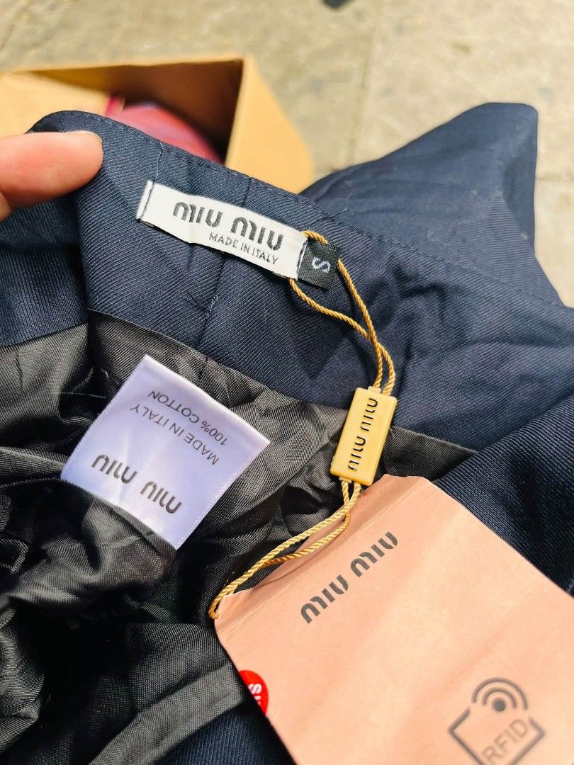 MIU MUI (Category: Skirts) located in Tacurong. Submitted by fiercemoon_4d0766 (Listing ID 1469969602, Image 2). Description: MIU Miu mini skirt with Hang tag.