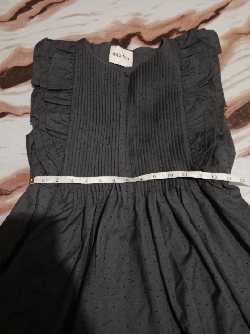 MIU MUI SLEEVELESS DRESS (Category: Dresses) located in Roxas, Palawan. Submitted by cabreramed14075 (Listing ID 1470085994, Image 2). Description: MIU MUI SLEEVELESS DRESS Excellent Condition Ganda nito No issue Color rate:9.8/10 Made in Italy Add Shipping fee Location Palawan.