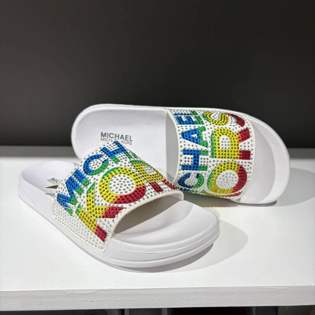 MK Jet Jae Slide Kids White (Category: Slippers and slides) located in Rizal. Submitted by hiraya16 (Listing ID 1469999573, Image 1). Description: Limited Quantity Onhand ready to ship Michael Kors US13/US1.