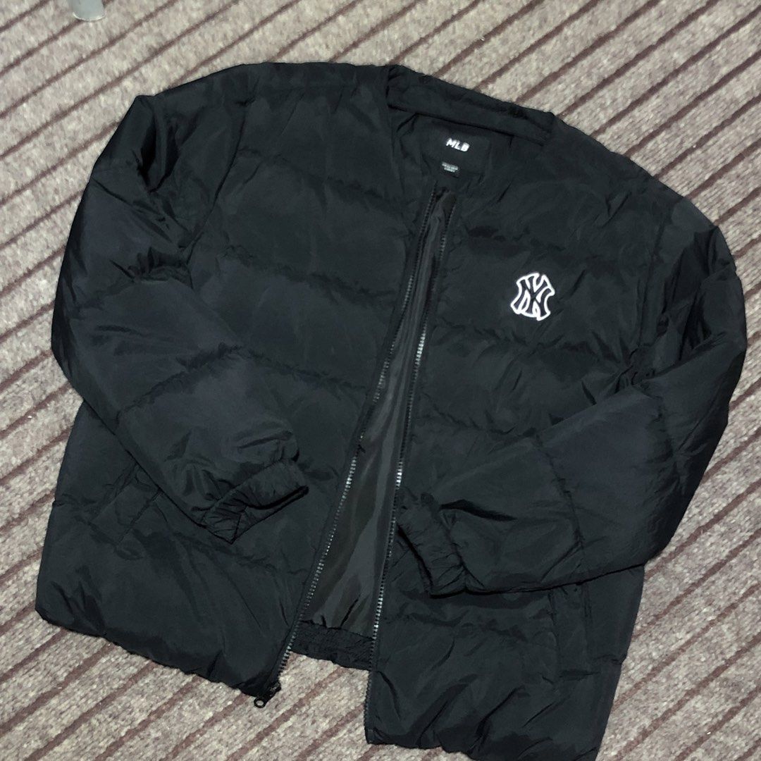 MLB New York Yankees Black Puffer Jacket Size 155 (Category: Coats, Jackets and Outerwear) located in Valenzuela. Submitted by thrift_collection.ph (Listing ID 1470115071, Image 1). Description: - Brand: MLB (New York Yankees) - Color: Classic Black - Size: 13Y / 155 - Material: Warm duck down and feather filling - Design: Zip-up front, collarless style (missing hood), chest logo - Condition: Clean inside and out, excellent warmth.