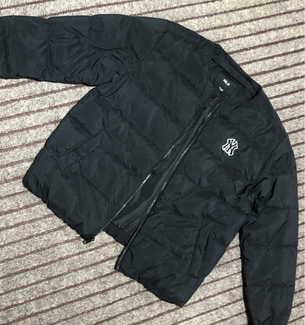 MLB New York Yankees Black Puffer Jacket Size 155 (Category: Coats, Jackets and Outerwear) located in Valenzuela. Submitted by thrift_collection.ph (Listing ID 1470115071, Image 2). Description: - Brand: MLB (New York Yankees) - Color: Classic Black - Size: 13Y / 155 - Material: Warm duck down and feather filling - Design: Zip-up front, collarless style (missing hood), chest logo - Condition: Clean inside and out, excellent warmth.