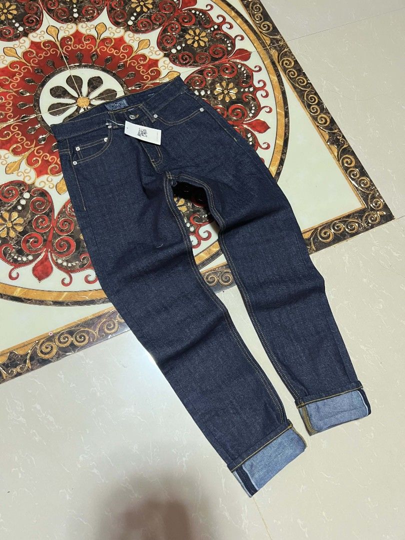 MODIFIED Raw Selvedge Denim Straight Jeans (Category: Jeans) located in Alegria. Submitted by goofy_ripper (Listing ID 1470079740, Image 3). Description: - Brand: Tobiten - Condition: Brand new with original tags attached (unworn) - Style: Straight cut, dark indigo wash - Fabric: Heavyweight with crisp structure - Details: Contrast yellow stitching, back leather patch, branded pocket tag - Selvedge ID: Clean cuffs with redline detail.